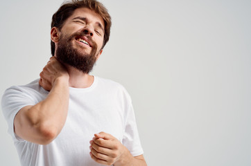 a man with a beard neck hurts