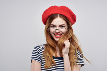 portrait of young woman in red hat