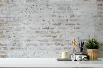 Minimal loft workspace with accessory and copy space on white desk