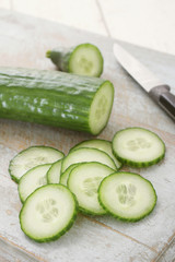 slicing fresh cucumber