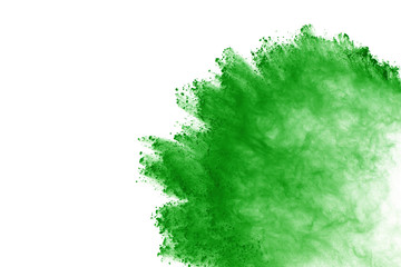 Green powder explosion on white background. Colored cloud. Color dust explode. Paint Holi.