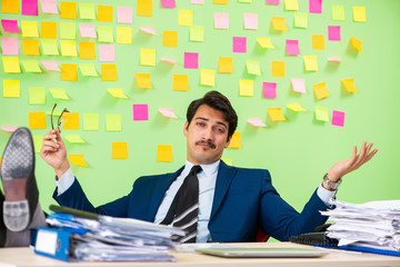 Businessman having trouble with his priorities