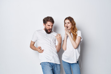 Fototapeta premium happy young couple in white shirts logo