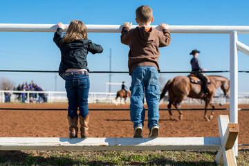 Children watching horse show