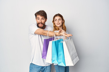 happy couple with shopping bags