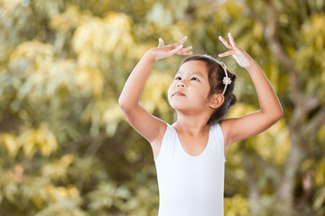 Cute asian child girl is practicing a ballet and dream of become ballerina © pingpao