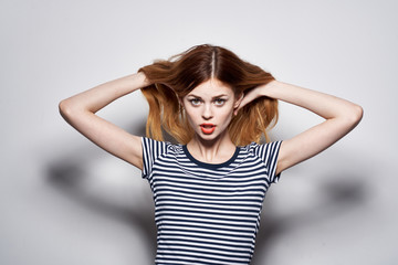 Fototapeta premium woman straightens hair