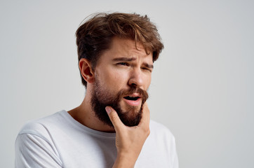 a man with a beard thinks a portrait