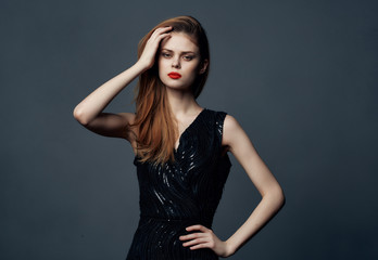 Fototapeta premium elegant woman in a dress with red lips