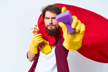 man cleans the apartment