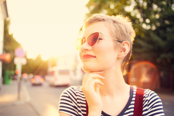 woman wearing city sun glasses