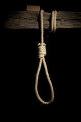 Rope from a rope on a wooden crossbeam