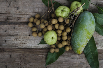 fruit on season on wood background Banana longan