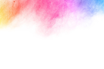 abstract powder splatted background. Colorful powder explosion on white background. Colored cloud....