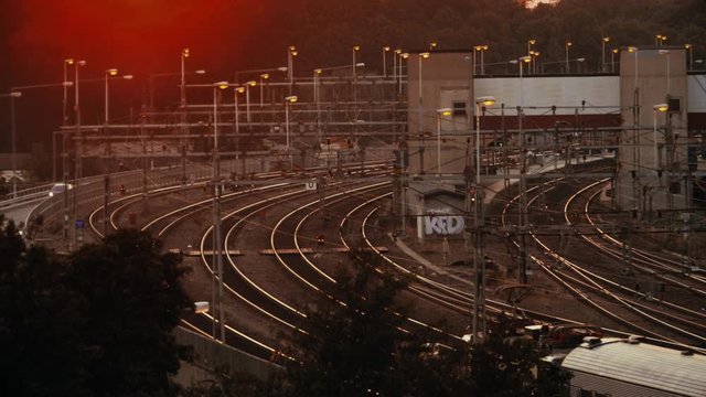 Wide View of a Passenger Train Slowly Arriving at a Station in Stockholm, Sweden