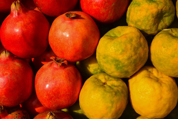 Fototapeta na wymiar Oranges and Red juice pomegranate background.