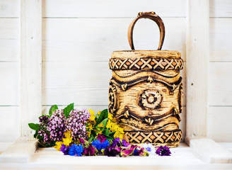 Herbal medicine. Healing herbs and flowers in birch bark boxes.