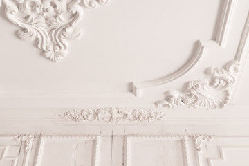 unfinished plaster molding on the ceiling. decorative gypsum finish. plasterboard and painting works