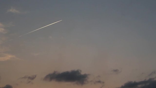 Rocket acrossing the sky.