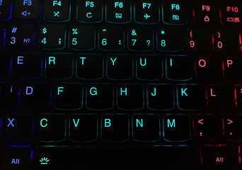 Closeup of multi-color keyboard. backlit keyboard concept background