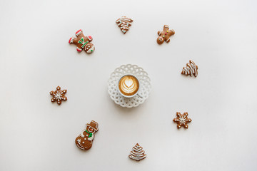 A cup of freshly flavored cappuccino coffee. Near the scenery in the Christmas or New Year's style. Christmas concept.