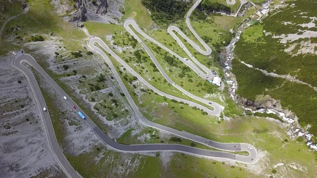 Road to the Stelvio mountain pass in Italy. Up and down amazing aerial view of the mountain bends creating beautiful shapes