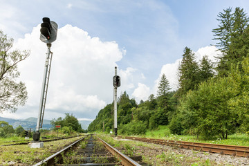 Railroad corridor, steel rail in nature background.