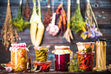 Pickled Marinated Fermented vegetables on shelves
