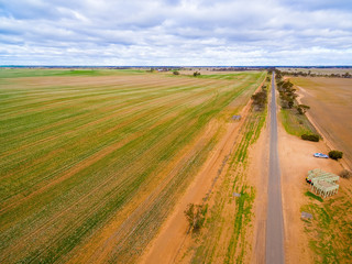 Fototapeta na wymiar Rural road and agricultural land aerial landscape