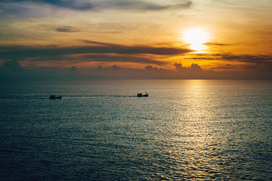 Sunset on the beach at phuket , Krating Cape.