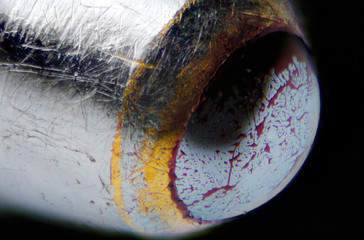 Extreme macro photo of the tip of a ballpoint pen.