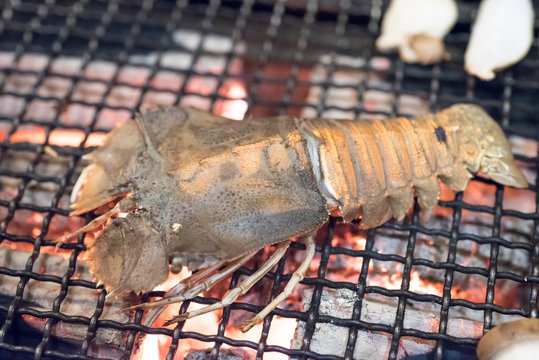 Grilling Flathead Lobster On The Sieve