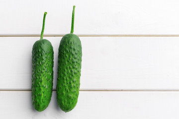 Cucumber on wooden background
