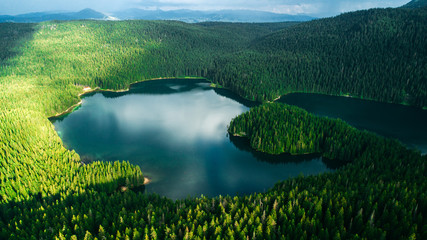 Aerial view at a beautiful lake in the mountains. Black Lake, Montenegro.