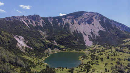 Šator Mountain (Šator planina) is in the Dinaric Alps, Bosnia and Herzegovina. Just below the peak, the Šator Lake (Šatorsko jezero) is positioned.