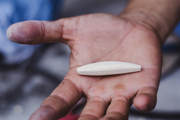 Hand made fishing lures. Making handcrafted fishing lures made of wood.