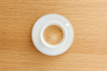 espresso coffee with cup and saucer on the wood table