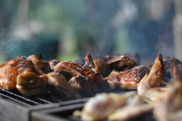 Cooking meat on a grill. Delicious fresh meat on a barbeque
