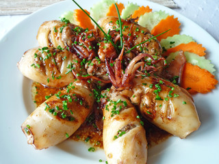 Grilled Squid with gralic and spring onion, slice of cucumber, carrot  