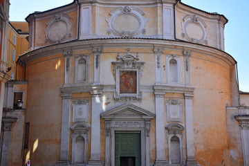 Fototapeta na wymiar Rome, facade of an ancient church in the historic center of the city.