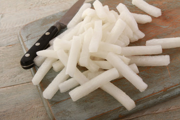 preparing fresh white raddish