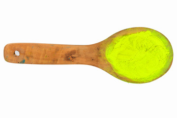 light yellow powder on wooden spoon with clipping path in isolated on white background