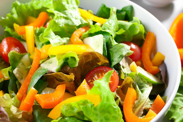 Bowl with fresh salad, closeup. Diet food