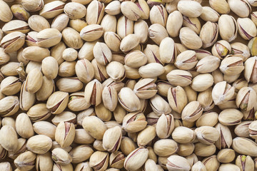 Salty pistachios nuts Background of the full population.