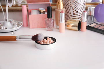 Fototapeta na wymiar Set of decorative cosmetics with accessories on white table
