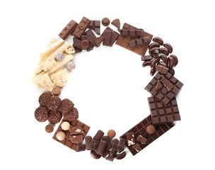 Delicious chocolate with candies on  white background