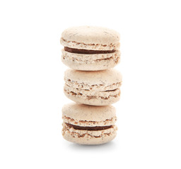 Tasty macarons on white background