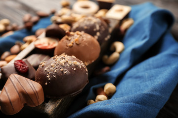 Yummy chocolate candies on tray