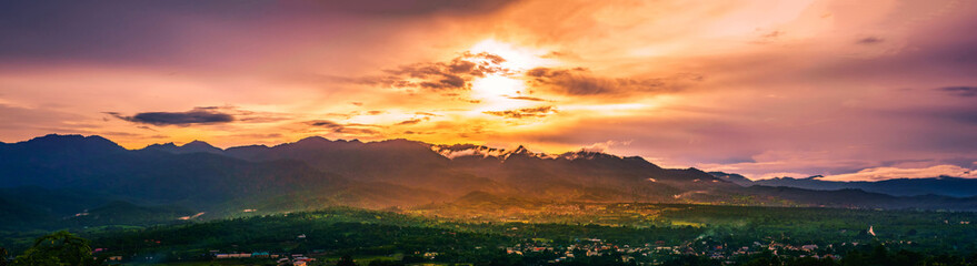 Panoramic Landscspe of thailand rural scence : Mountain rang behind the valley during Sunset