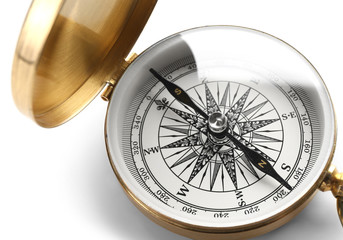 Vintage compass on white background, closeup